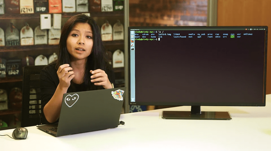 Instructor Cindy Quach with a screenshot of a Linux command